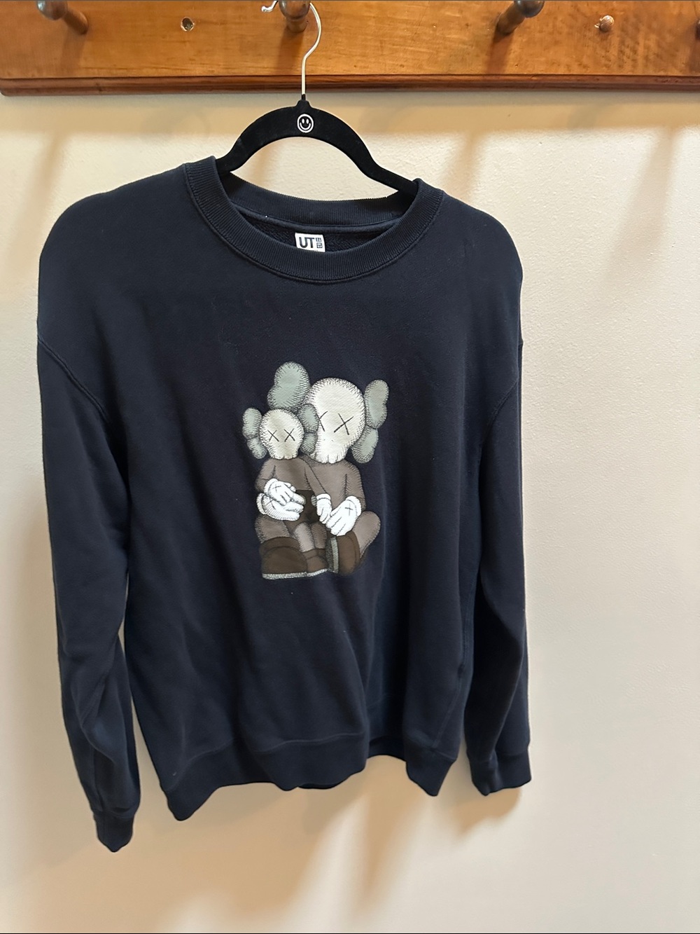 Uniqlo Black Crewneck Sweater with Neutral Character Graphic